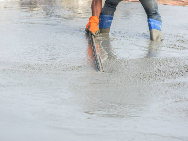 istock Men are skimming the concrete surface from Pouring ready-mixed concrete 1029179702