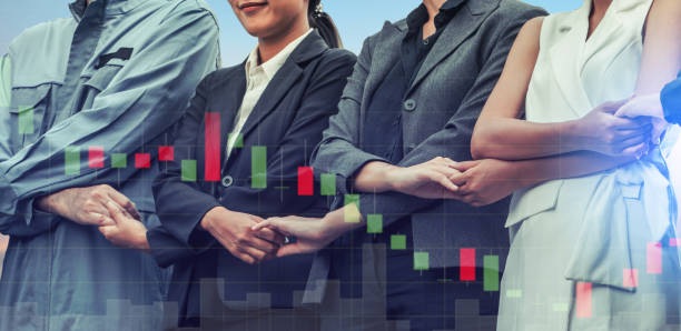 istock Double exposure business people holding hands. 1029182224