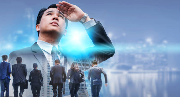 istock Double exposure - Business Leader and Team. 1029182232