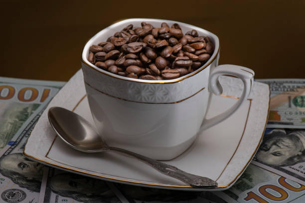 istock Coffee beans in Cup on brown background 1029182784