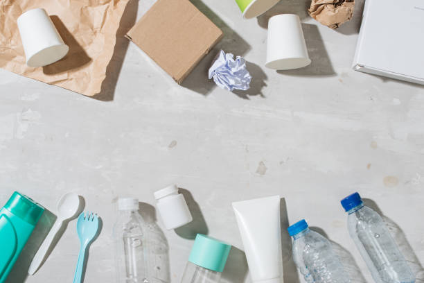 istock No plastic recycle concept white plastic dishes plates cups spoon isolated white background, copy space, top view 1029194262