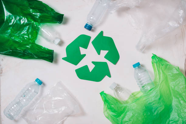 istock Eco concept with recycling symbol on table background top view 1029194294