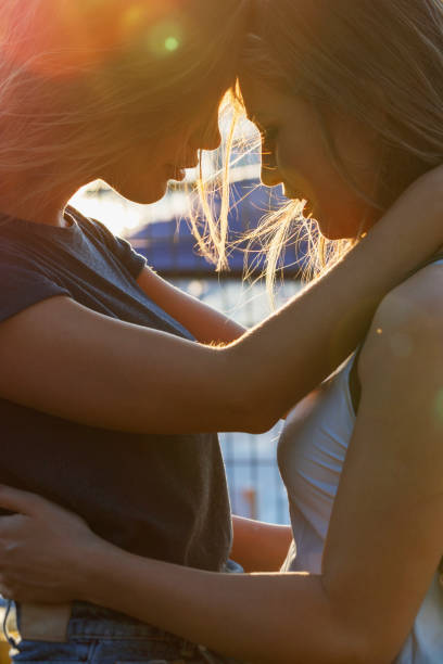 istock Couple Hugging and Touching Foreheads 1029197706