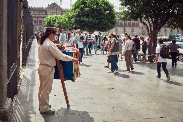 Barrel organ street player Mexico City, Mexico - August 22, 2018: Barrel organ street player in downtown Mexico City hurdy gurdy stock pictures, royalty-free photos & images