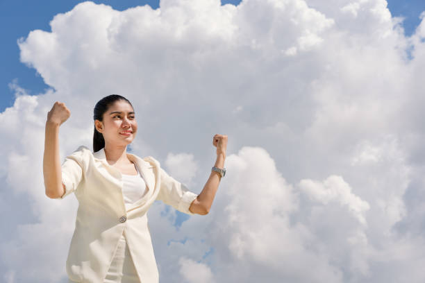 istock Successful businesswoman with blue sky cloud. Cloud computing, Online technology, Expressing Background for advertising. 1029210038