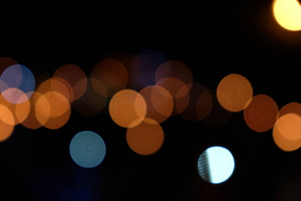 istock Abstract Defocused Lights, Bokeh on Black Background 1029210218
