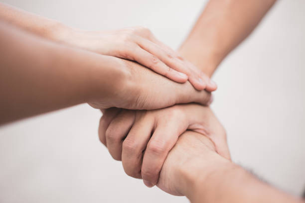 istock Close up teamwork stack of hands together. Togetherness Collaboration Concept 1029214494