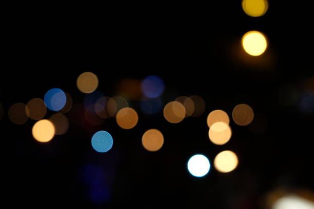 istock Abstract Defocused Lights, Bokeh on Black Background 1029214984