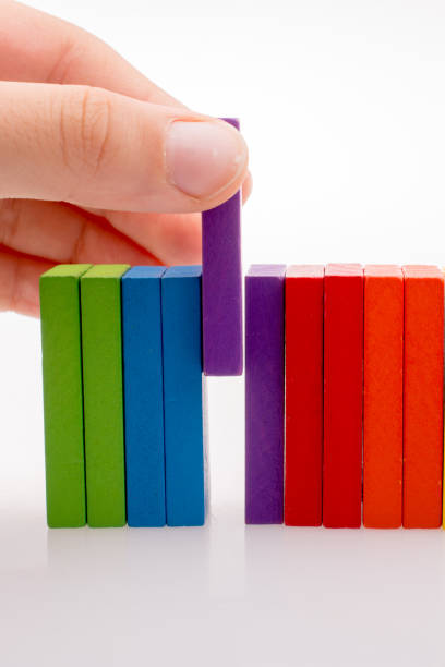 istock Hand holding color dominoes 1029224782