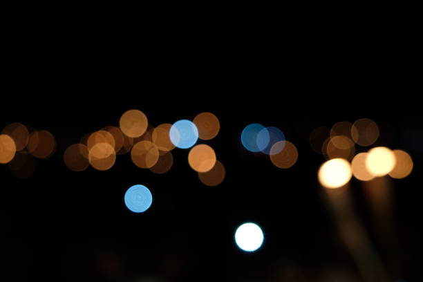 istock Abstract Defocused Lights, Bokeh on Black Background 1029227358