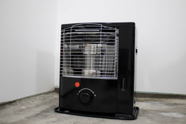 istock Black kerosene heater in a white background composition 1029228560