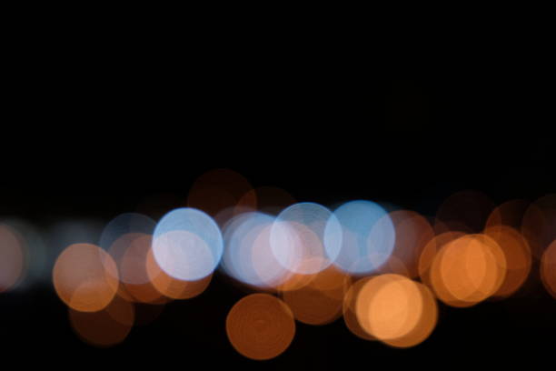 istock Abstract Defocused Lights, Bokeh on Black Background 1029228828
