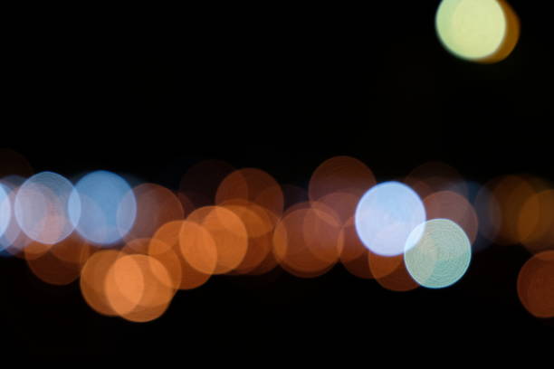 istock Abstract Defocused Lights, Bokeh on Black Background 1029230906