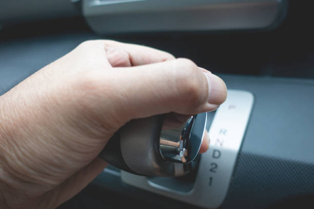 istock Hand on shifting automatic car gear to Drive 1029231164