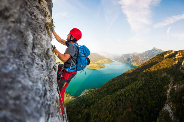 rock climbing in alps - climbing adventure moving up clambering imagens e fotografias de stock