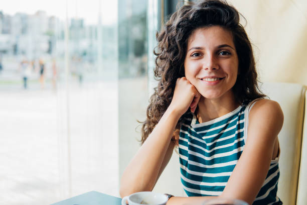 istock Beautiful woman at coffee shop 1029242558