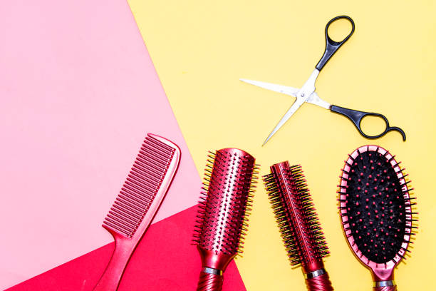 istock Professional hairdressing tools isolated on colorful background with copy space 1029242858