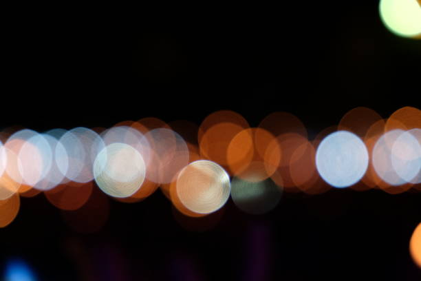 istock Abstract Defocused Lights, Bokeh on Black Background 1029243334