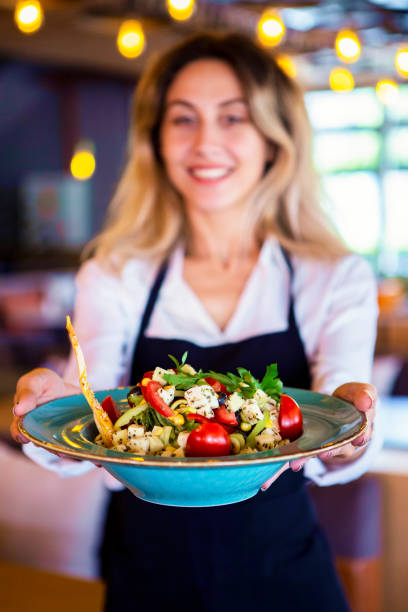 istock Waitress in a cafe taking the order 1029252700