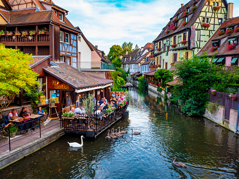 Colmar France , August 09th of 2018 Beautiful city of Colmar in the Alsace France. Part of the city is known as Petite Venice because of the canals that go along the old half timbered houses. Nowadays it is a very popular destination.