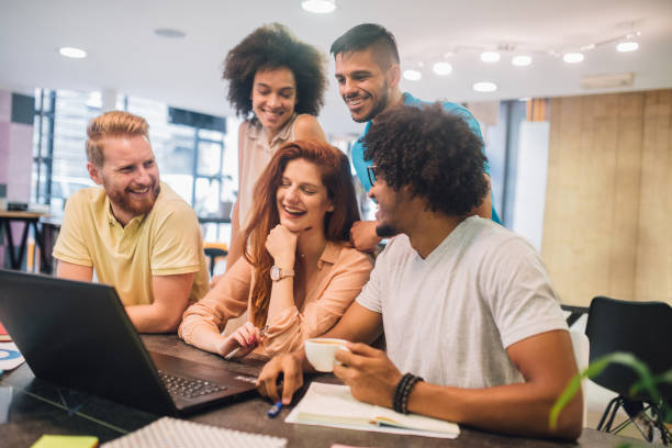 istock Young people working together on a laptop in an office 1029264978