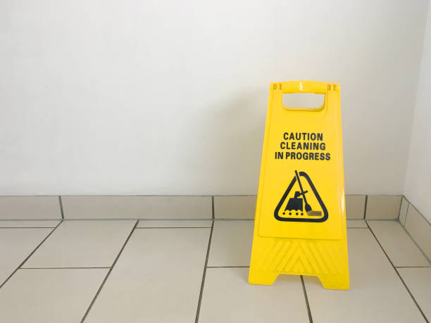 istock Cleaning in progress caution yellow sign on office floor 1029265012