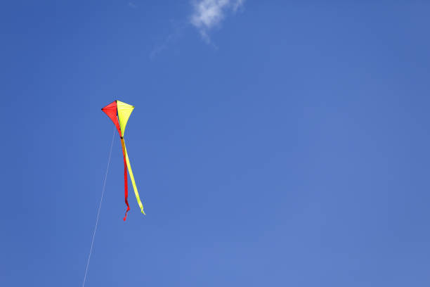 istock Colorful kite in the blue sky 1029268722