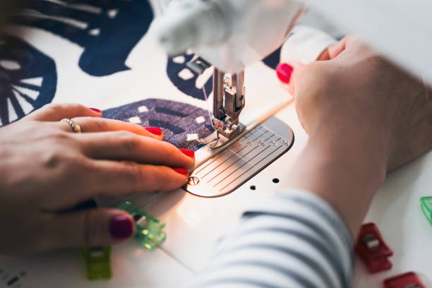 Japanese woman making handcraft product at working space.