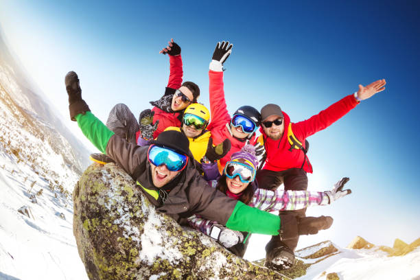 istock Group happy friends crazu fun ski resort 1029280784