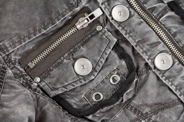 istock Metal fittings on quilted jacket from tissue 1029287576