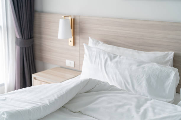 istock modern bedroom with wooden bed 1029297750