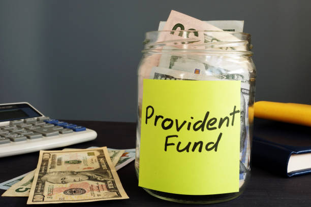 istock Jar with money and label Provident fund PF. 1029298524
