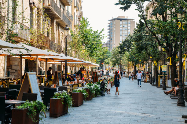 Rambla de la Libertal is the main street that passes through central girona in Catalonia. The street is lined with cafes and restaurants and a major tourist attraction stock photo