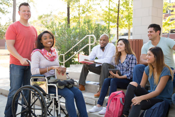 istock College student friends talking together on university campus. 1029310570