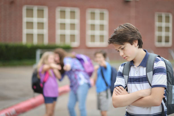 istock Pre-adolescent boy being bullied at school. 1029319910