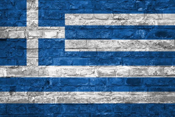 istock Flag of Greece over an old brick wall background, surface 1029320252