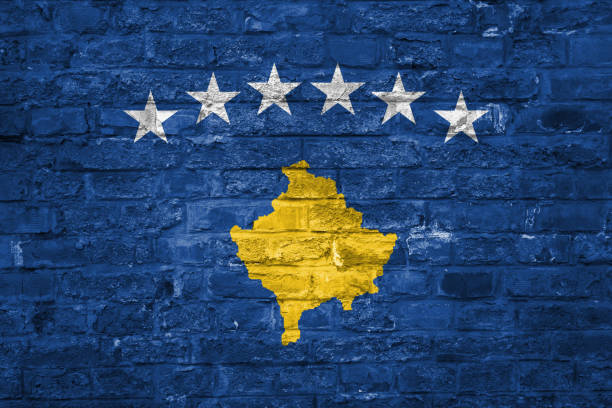 istock Flag of Kosovo over an old brick wall background, surface 1029320510