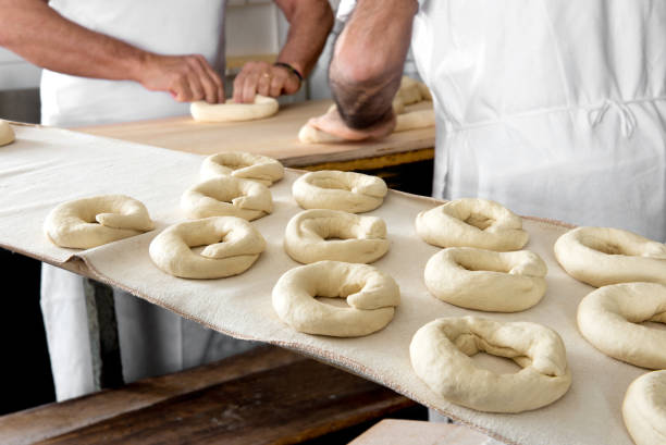 istock Midsection Of Men Preparing Food In Kitchen 1029323766