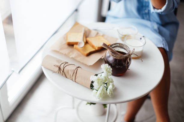 Woman preparing healthy breakfast at home