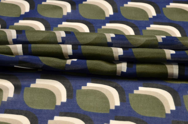 istock Cotton fabric with geometric ornament on blue, cambric 1029328286