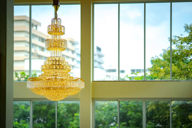 Light concept, chandelier or ceiling light on blurred room modern hotel background. Beautiful chandelier electricity save energy.