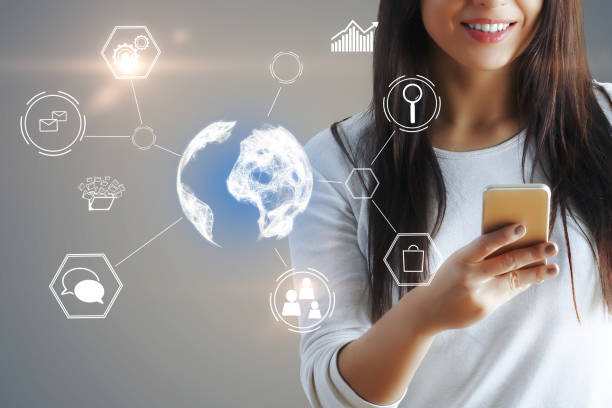 istock woman with smartphone and global network system 1029333884