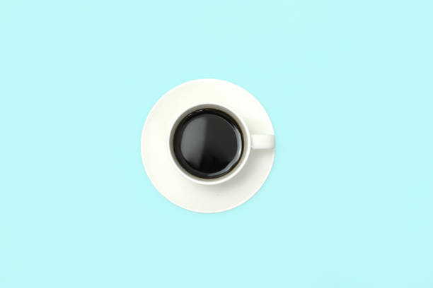 istock hot coffee black coffee isolated on colorful background 1029334316