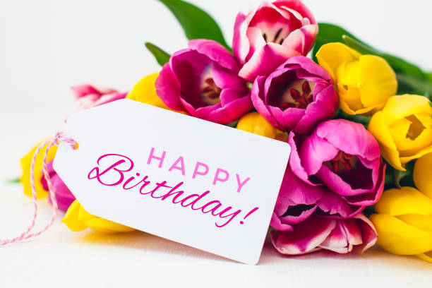 istock Close-Up Of Bouquet With Text Over White Background 1029350110