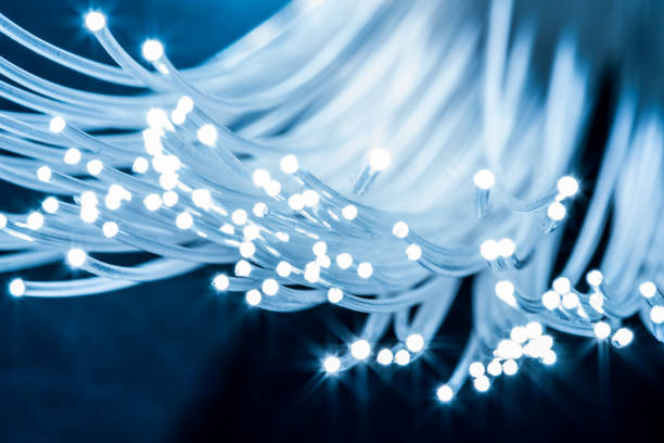 istock Bundle of optical fibers with lights in the ends. 1029350918