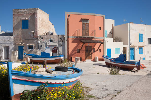 Punto Longa village, Favignana, Sicily The fishing village of Punto Longa on the mediterranean island of Favignana which belongs to the Aegadian island archipelago of Sicily, Italy favignana photos stock pictures, royalty-free photos & images