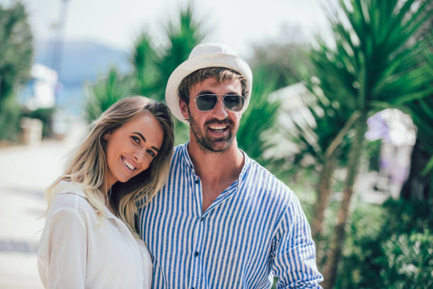 istock Beautiful couple taking a walk in city park 1029357458