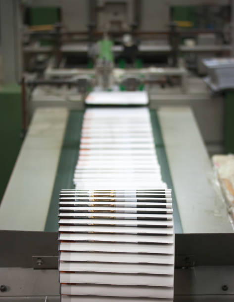 istock Close-Up Of Blank Papers In Printing Press 1029357648