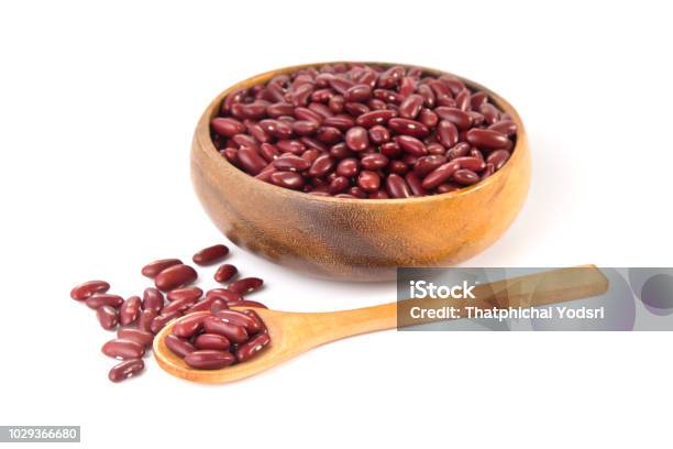 Red Beans In Wooden Bowl And Spoon Isolated On White Background Stock Photo - Download Image Now