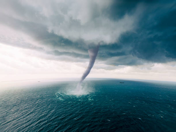 Tornado Sea Tornado on the Sea - bird view (high angle view) hurricane storm photos stock pictures, royalty-free photos & images